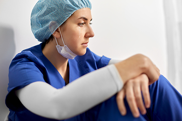 Image showing crying female doctor or nurse at hospital