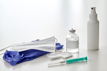 Image showing syringe, medicine, wound wipes, gloves and mask