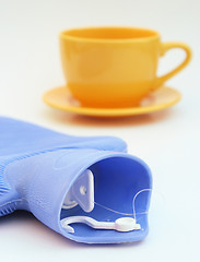 Image showing Cup and hot water bottle