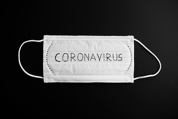 Image showing face protective medical mask with coronavirus