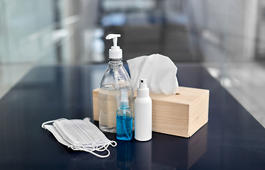 Image showing hand sanitizers, masks, liquid soap and tissues