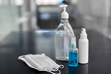 Image showing hand sanitizers, medical masks and liquid soap