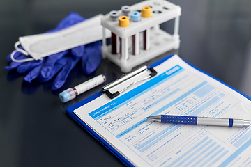 Image showing medical report, blood tests, gloves and mask