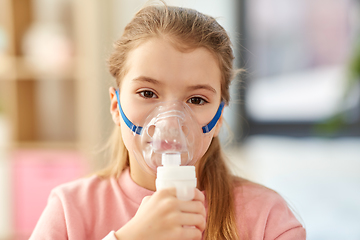 Image showing sick little girl wearing oxygen mask