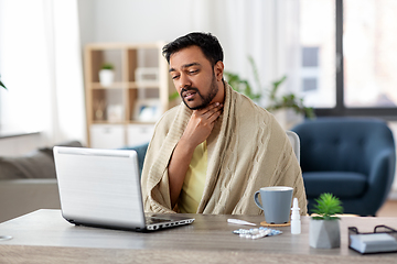 Image showing sick indian man having video call on laptop