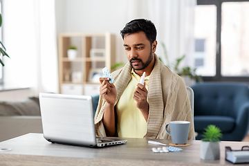 Image showing sick man thermometer having video call on laptop