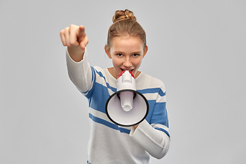 Image showing teenage girl speaking to megaphone