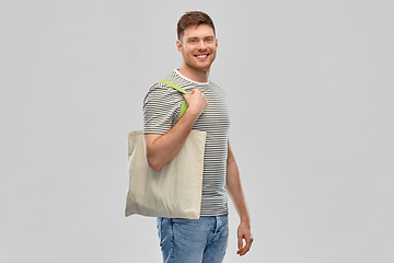 Image showing man with reusable canvas bag for food shopping