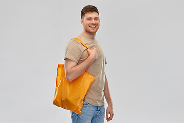 Image showing man with reusable canvas bag for food shopping