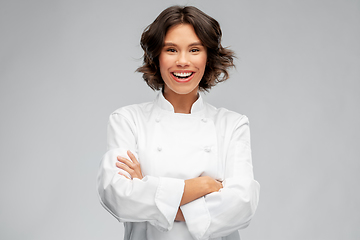 Image showing smiling female chef in toque