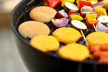 Image showing barbecue kebab meat and vegetables on grill