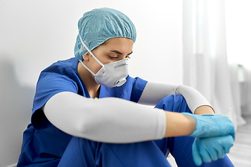 Image showing sad doctor or nurse in protective face mask