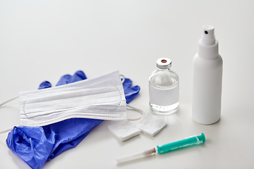 Image showing syringe, medicine, wound wipes, gloves and mask