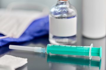 Image showing syringe, medicine, wound wipes, gloves and mask