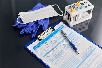 Image showing medical report, blood tests, gloves and mask