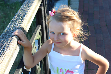 Image showing little fashionable girl with beautiful modern coiffure