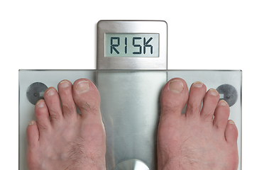 Image showing Man\'s feet on weight scale - Risk