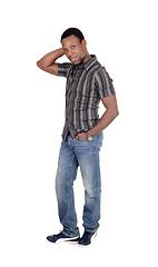 Image showing Disappointed looking African man standing