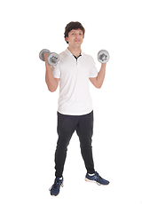 Image showing Young man exercise wit two dumbbell