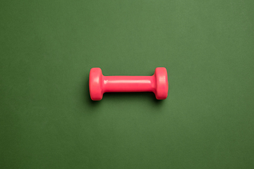 Image showing Sport equipment isolated on green studio background