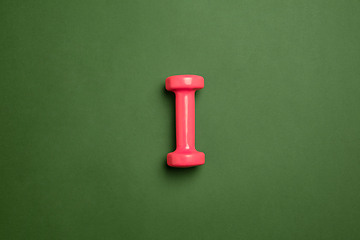 Image showing Sport equipment isolated on green studio background