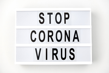 Image showing lightbox with stop coronavirus caution words