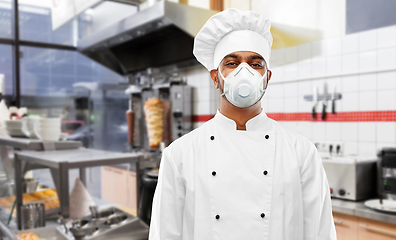 Image showing male chef with in respirator at kebab shop kitchen