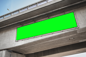 Image showing billboard with green chroma key screen on bridge
