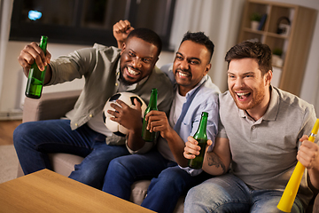 Image showing friends or soccer fans with ball and beer at home