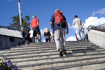 Image showing Walking up the stairs