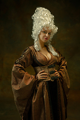 Image showing Medieval young woman in old-fashioned costume