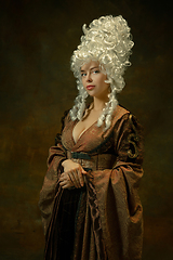 Image showing Medieval young woman in old-fashioned costume