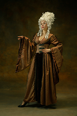 Image showing Medieval young woman in old-fashioned costume