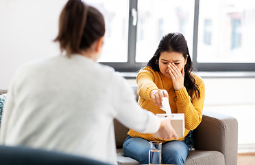 Image showing crying woman patient at psychotherapy session