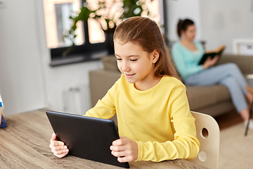 Image showing student girl with tablet pc and mother at home