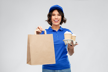 Image showing delivery woman with takeaway food and drinks