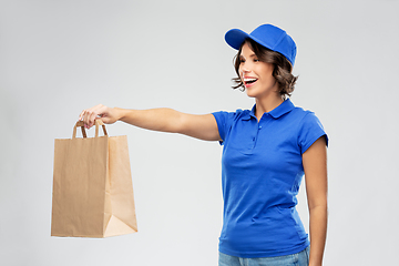 Image showing delivery woman with takeaway food in paper bag