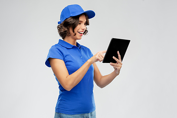 Image showing happy smiling delivery girl with tablet computer