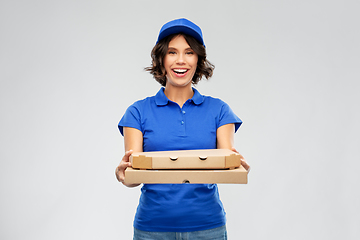 Image showing delivery woman with takeaway pizza boxes