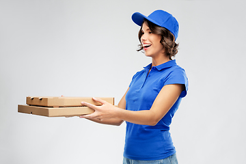 Image showing delivery woman with takeaway pizza boxes