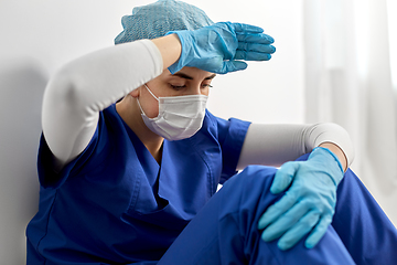 Image showing sad doctor or nurse in protective face mask