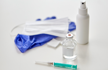 Image showing syringe, medicine, wound wipes, gloves and mask