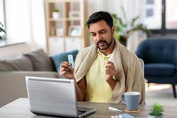 Image showing sick man thermometer having video call on laptop