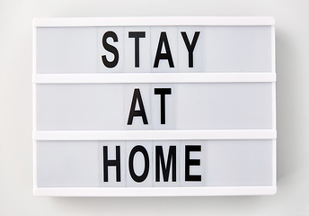 Image showing lightbox with stay at home caution words