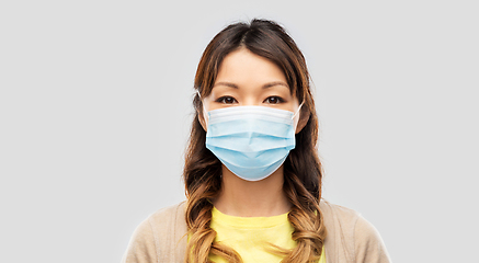 Image showing portrait of asian woman in protective medical mask