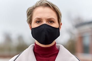 Image showing woman wearing protective reusable barrier mask