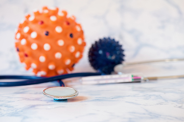 Image showing Medical stethoscope or phonendoscope over light blue background