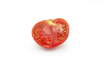 Image showing Cut red tomatoe on a white background