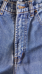 Image showing Fragment of classic blue fashioned jeans