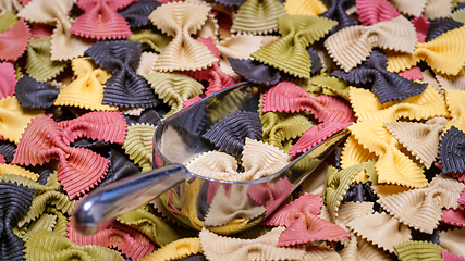 Image showing Colored Farfalle Pasta bow tie pasta background.